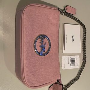 Coach large wristlet F31584.  Silver hardware/Carnation pink.